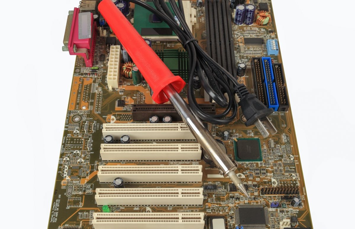 soldering iron and computer motherboard soldering iron and computer motherboard